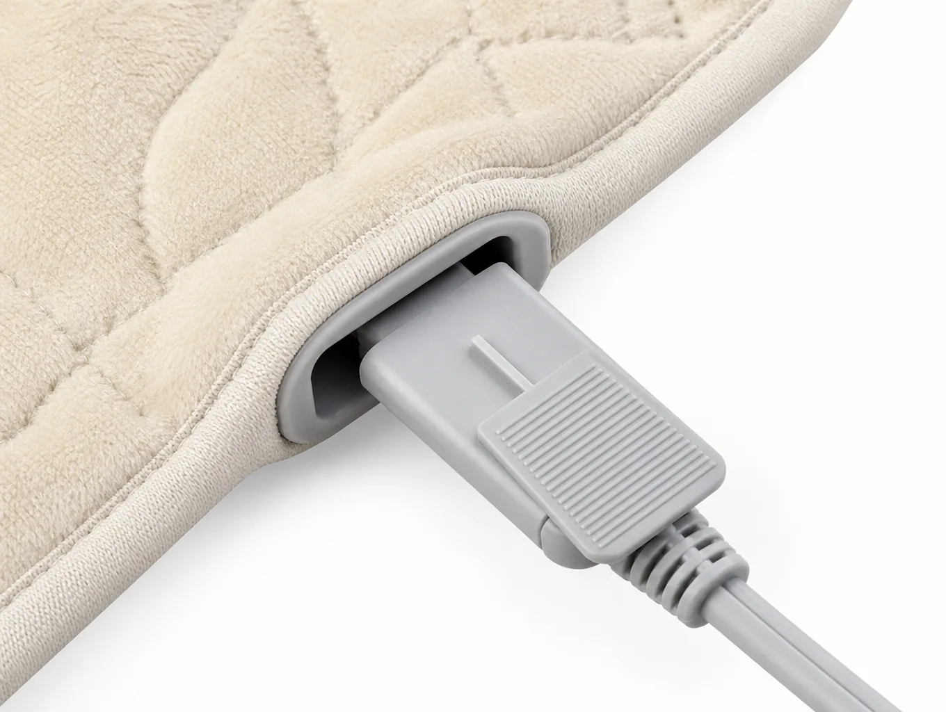 Close-up of the keyed quick-connect plug, pull tab and bound socket