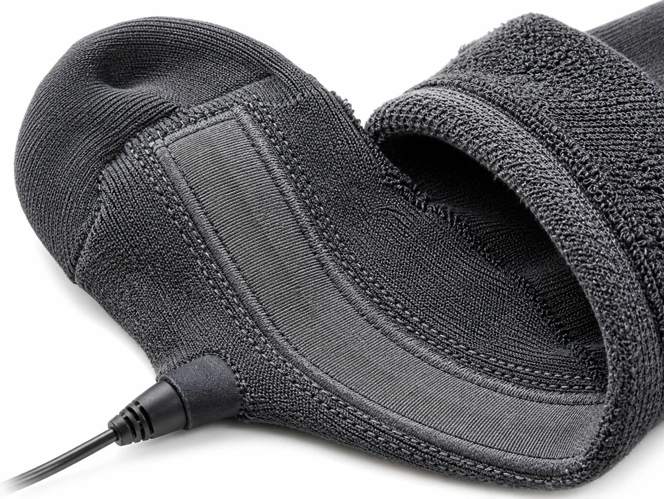 Close-up of the sole channel and toe-cap zone with the ribbon element, stitching and cord boot