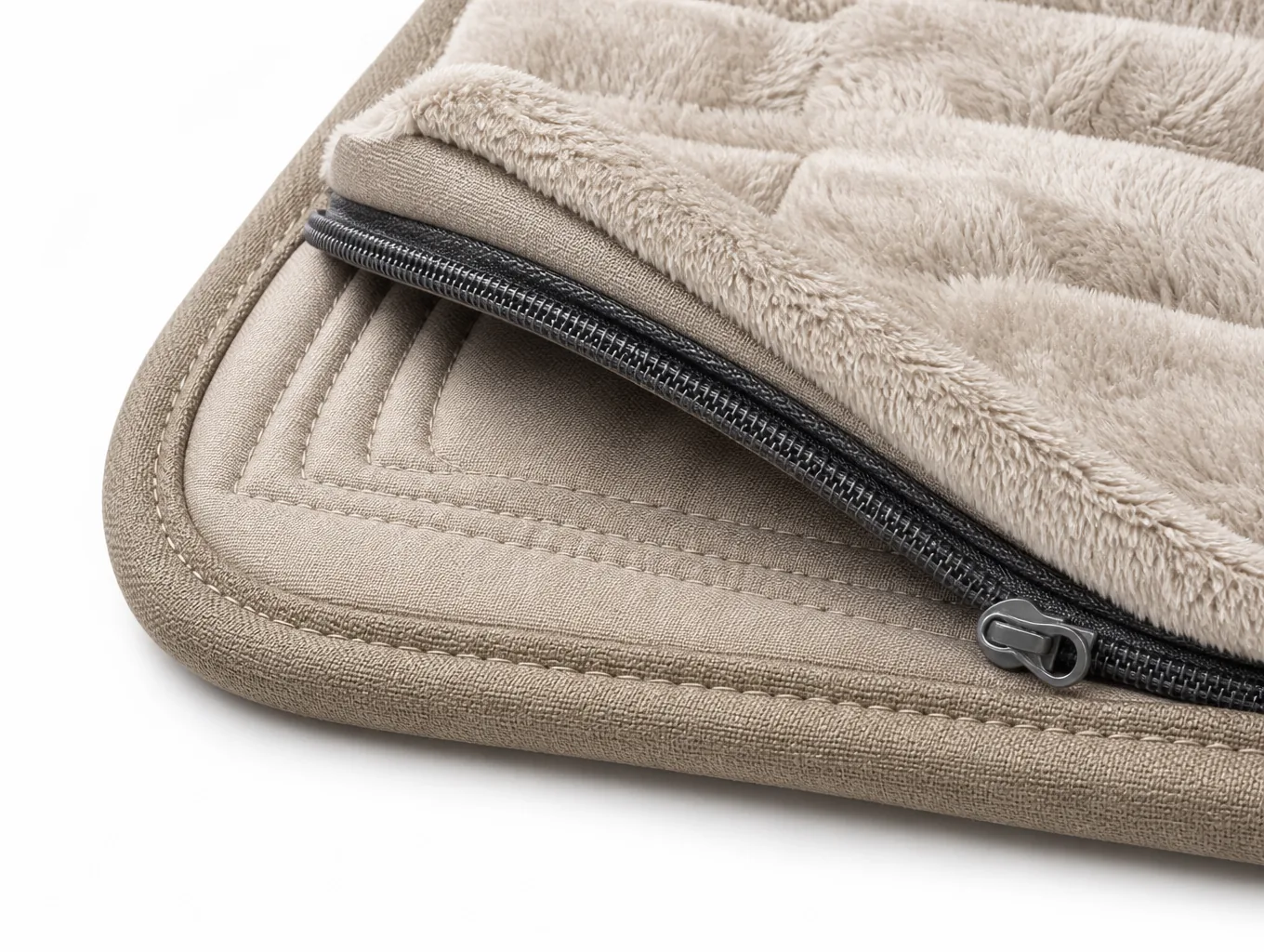 Close-up of the removable cover zip and the bound corner